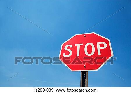 Stop sign against blue sky View Large Photo Image Stock Photo - Stop sign against blue sky. Fotosearch
