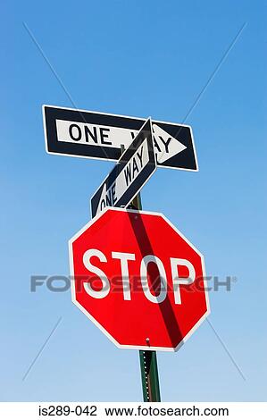 Stock Image - Stop sign and one way signs. Fotosearch