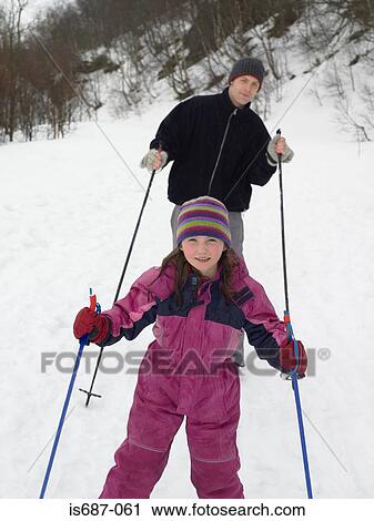 Father and daughter skiing View Large Photo Image Stock Image - Father and daughter skiing. Fotosearch