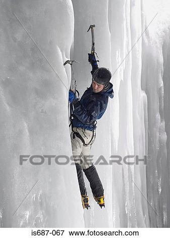 Man ice climbing View Large Photo Image Stock Photo - Man ice climbing. Fotosearch