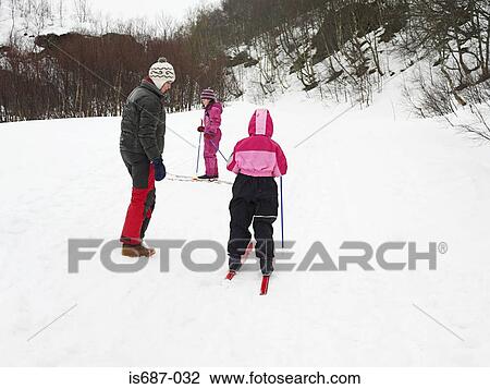Mother and daughters skiing View Large Photo Image Stock Image - Mother and daughters skiing. Fotosearch