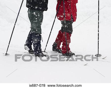 Two skiers View Large Photo Image Stock Photo - Two skiers. Fotosearch