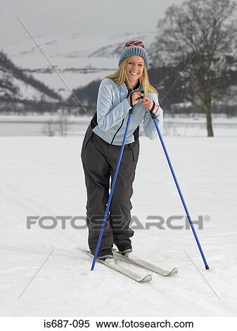 Woman on skis View Large Photo Image Stock Photography - Woman on skis. Fotosearch