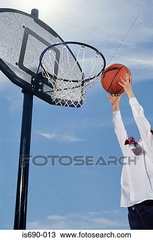 Boy playing basketball View Large Photo Image Stock Image - Boy playing basketball. Fotosearch