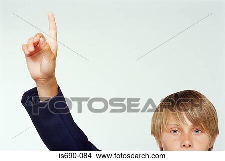 Boy raising his hand View Large Photo Image Picture - Boy raising his hand. Fotosearch