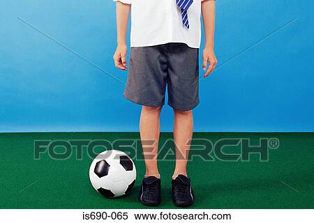 Boy with football View Large Photo Image Stock Photography - Boy with football. Fotosearch