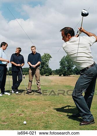 Men playing golf View Large Photo Image Stock Image - Men playing golf. Fotosearch