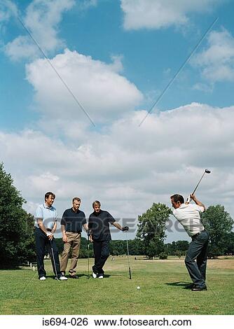 Men playing golf View Large Photo Image Stock Photograph - Men playing golf. Fotosearch
