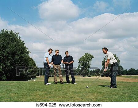 Men playing golf View Large Photo Image Stock Photography - Men playing golf. Fotosearch