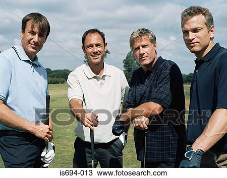 Rear view of four golfers View Large Photo Image Stock Image - Rear view of four golfers. Fotosearch