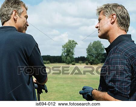 Two golfers View Large Photo Image Stock Image - Two golfers. Fotosearch