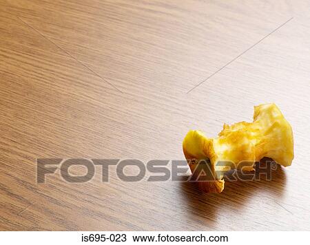 Apple core on a table View Large Photo Image Stock Image - Apple core on a table. Fotosearch