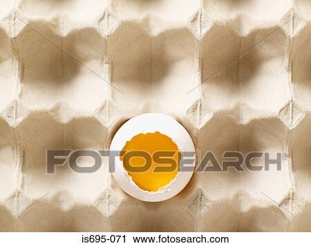Broken egg in carton View Large Photo Image Stock Image - Broken egg in carton. Fotosearch