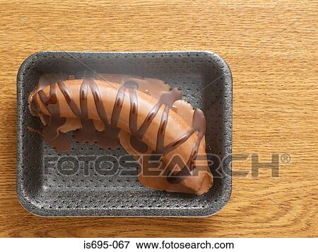 Chocolate covered banana View Large Photo Image Stock Photo - Chocolate covered banana. Fotosearch