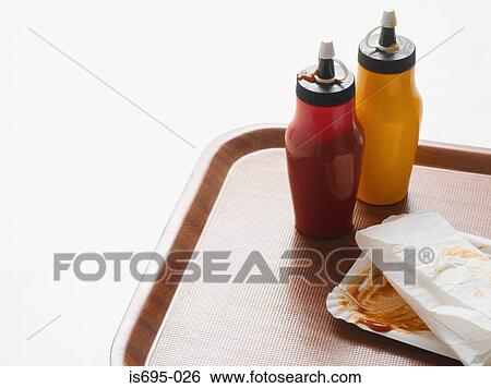 Fast food leftovers on a tray View Large Photo Image Stock Photograph - Fast food leftovers on a tray. Fotosearch