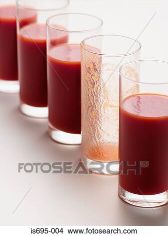 Glasses of tomato juice View Large Photo Image Picture - Glasses of tomato juice. Fotosearch