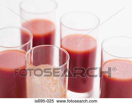 Glasses of tomato juice View Large Photo Image Stock Photography - Glasses of tomato juice. Fotosearch