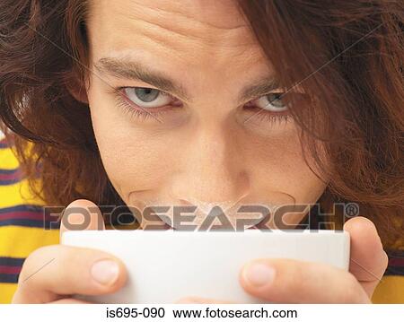 Man drinking milk View Large Photo Image Stock Image - Man drinking milk. Fotosearch
