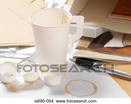 Paper cup in an office View Large Photo Image Picture - Paper cup in an office. Fotosearch