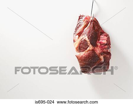 Piece of beef on a hook View Large Photo Image Picture - Piece of beef on a hook. Fotosearch