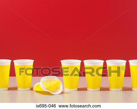 Stock Photograph - Row of plastic cups. Fotosearch