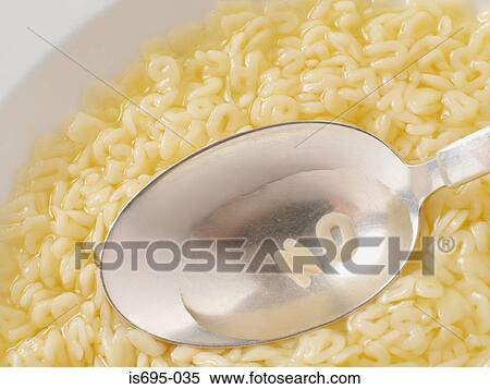 Stock Photography - Spaghetti word on a spoon. Fotosearch