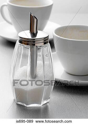 Stock Photo - Sugar shaker and cups. Fotosearch