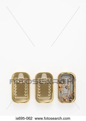 Stock Image - Three tins of sardines. Fotosearch