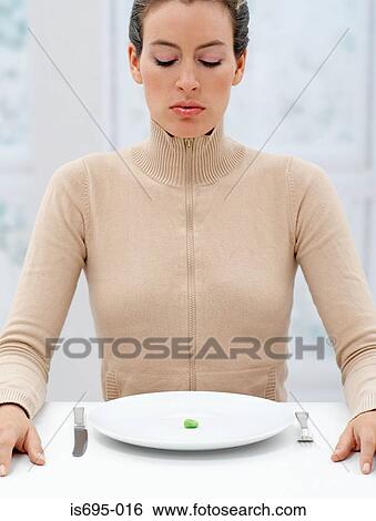 Woman dieting View Large Photo Image Stock Photograph - Woman dieting. Fotosearch