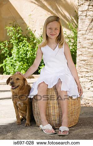 Girl with pet dog View Large Photo Image Stock Photo - Girl with pet dog. Fotosearch