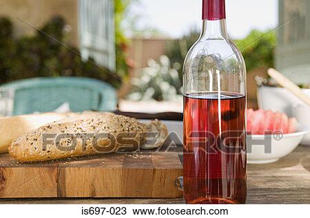 Stock Image - Rose wine and bread. Fotosearch