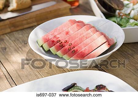 Stock Photo - Slices of watermelon in a bowl. Fotosearch