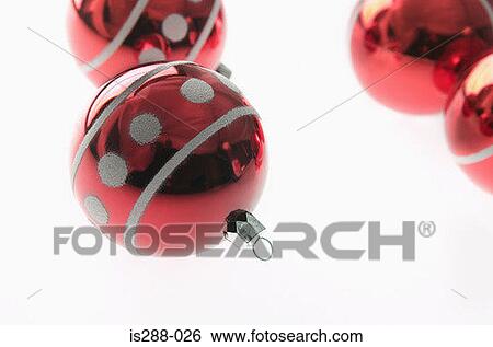 Four red baubles View Large Photo Image Stock Photograph - Four red baubles. Fotosearch