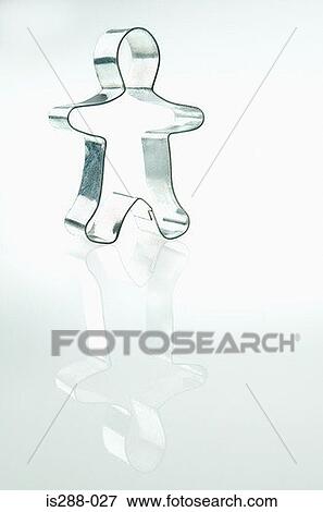 Stock Photo - Gingerbread man shaped cookie cutter. Fotosearch