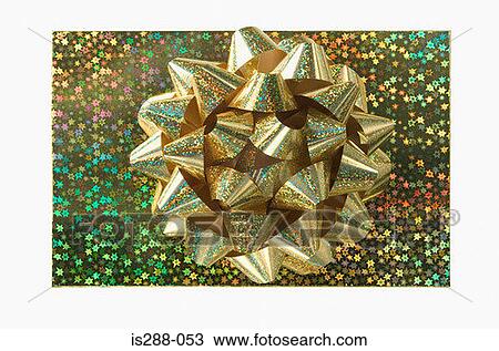 Golden bow on a gift View Large Photo Image Stock Image - Golden bow on a gift. Fotosearch