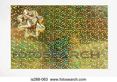 Stock Image - Golden bow on a gift. Fotosearch
