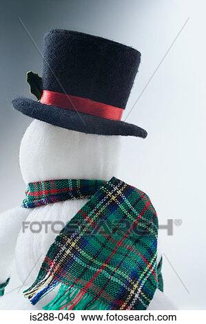Stock Photo - Rear view of a snowman. Fotosearch