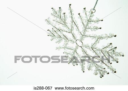 Stock Photo - Silver snowflake decoration. Fotosearch