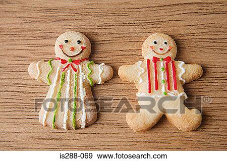 Stock Photo - Two gingerbread men. Fotosearch