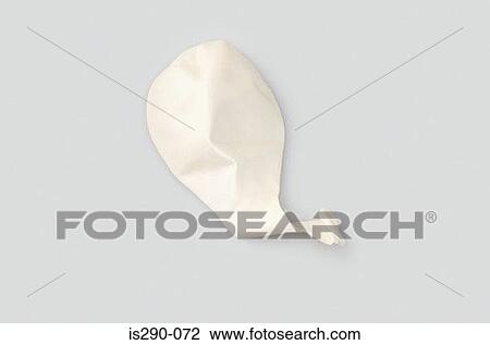 Stock Image - Deflated balloon. Fotosearch