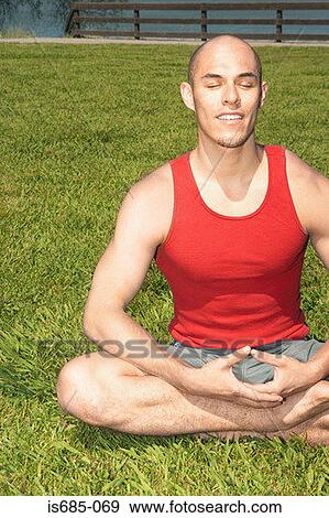 Man meditating View Large Photo Image Stock Photo - Man meditating. Fotosearch
