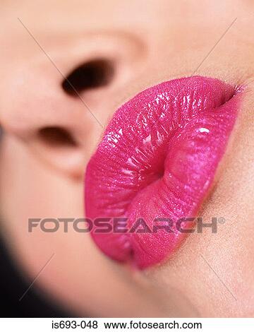 Stock Photo - Puckering up. Fotosearch