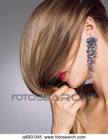 Woman covering face with hair View Large Photo Image Stock Photography - Woman covering face with hair. Fotosearch