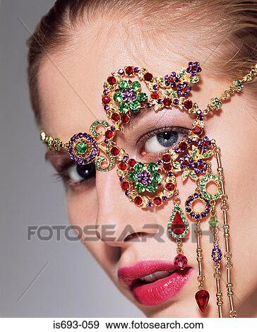 Woman wearing face decoration View Large Photo Image Stock Photo - Woman wearing face decoration. Fotosearch