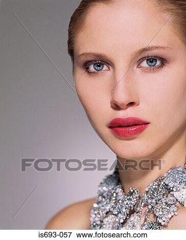 Woman wearing glamorous necklace View Large Photo Image Stock Photo - Woman wearing glamorous necklace. Fotosearch