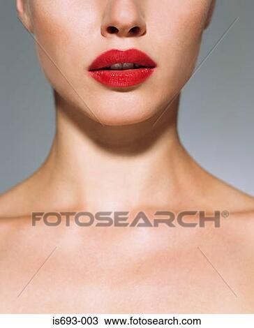 Stock Image - Woman wearing red lipstick. Fotosearch