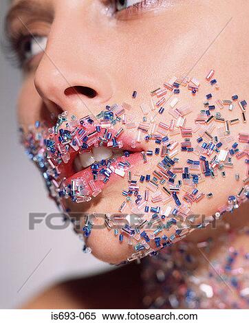 Woman with beads on her face View Large Photo Image Stock Photography - Woman with beads on her face. Fotosearch