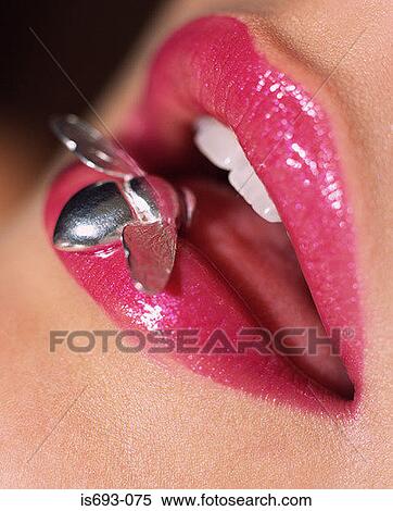 Woman with silver bee on her lip View Large Photo Image Stock Photography - Woman with silver bee on her lip. Fotosearch