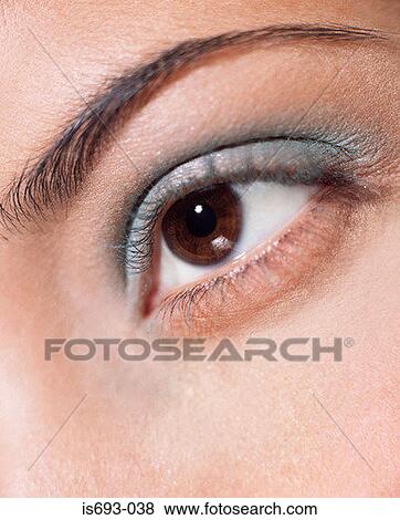 Woman's eye with green eyeshadow View Large Photo Image Stock Photo - Woman's eye with green eyeshadow. Fotosearch