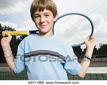 Boy holding tennis racket View Large Photo Image Stock Photo - Boy holding tennis racket. Fotosearch